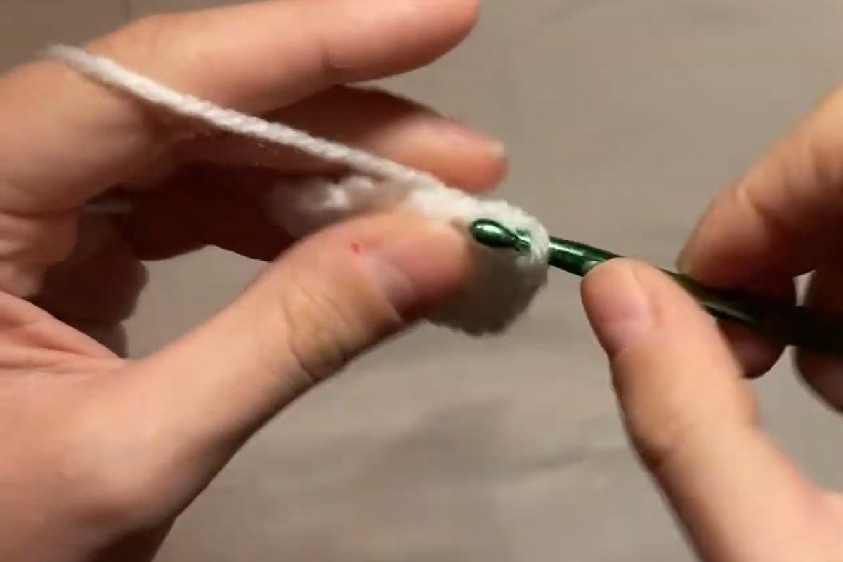 increase rounds of a free crochet snowman pattern making the flat top of the head