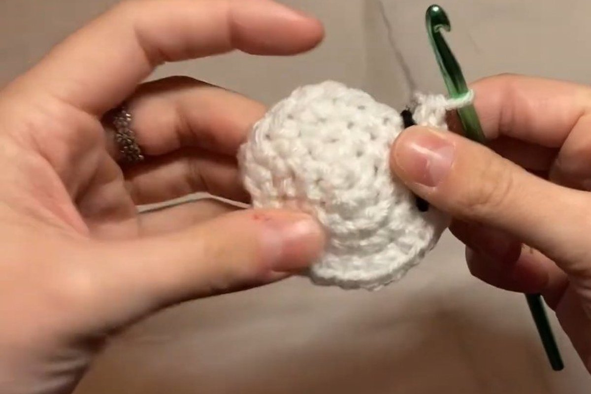 straight rounds of a free crochet snowman pattern forming the sides of the head