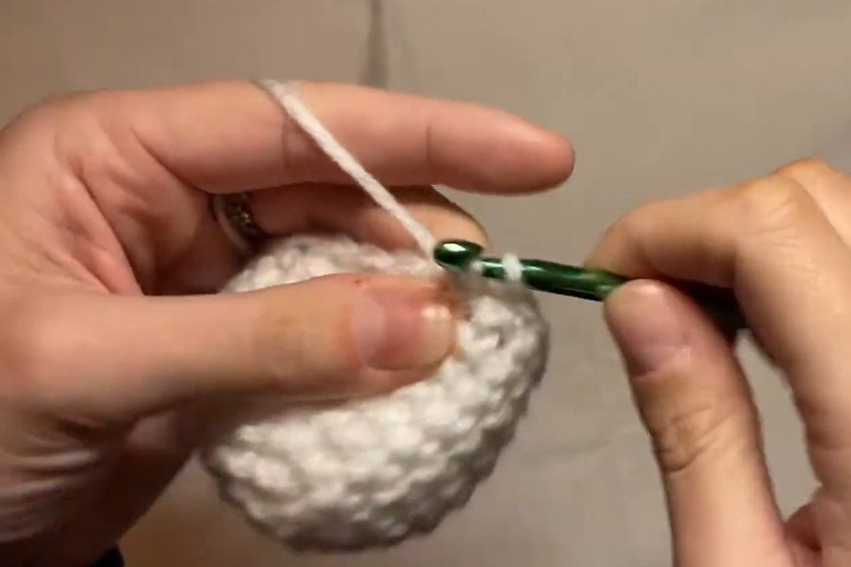 decrease rounds shaping the head of a free crochet snowman pattern
