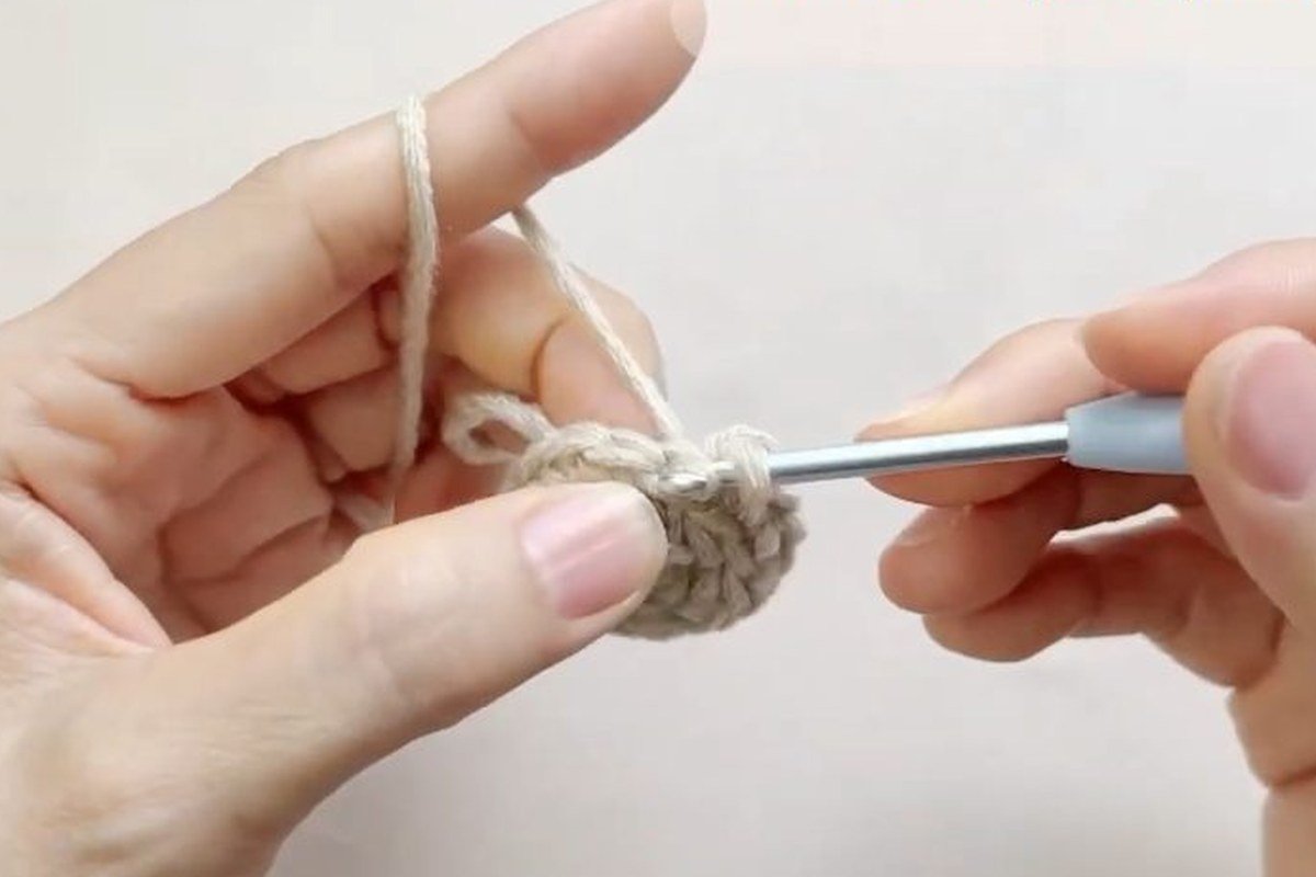 round 4 of a free crochet pinecone pattern, the widest round with 21 stitches