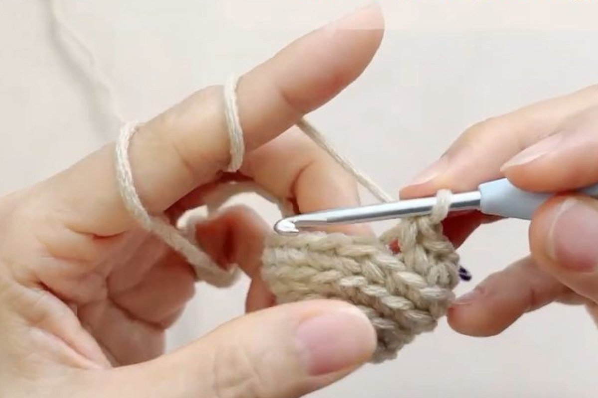 round 6 of a free crochet pinecone pattern with the first decreases
