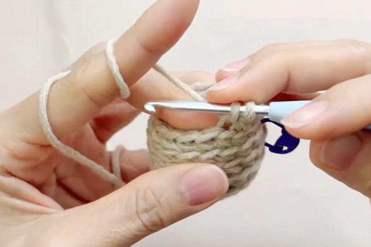 round 9 of a free crochet pinecone pattern with 12 stitches left
