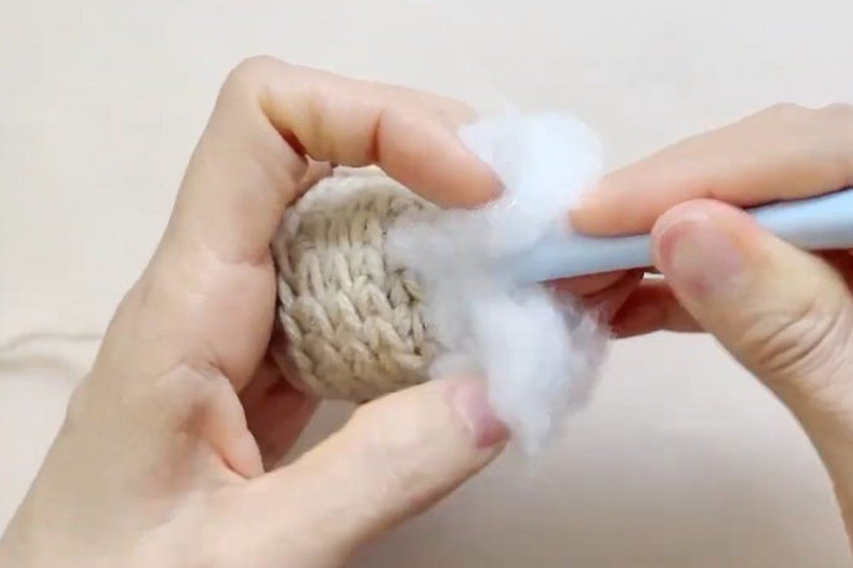 adding more fiberfill to the core of a free crochet pinecone pattern