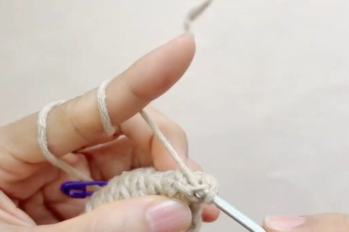 round 10 closing the top of a free crochet pinecone pattern