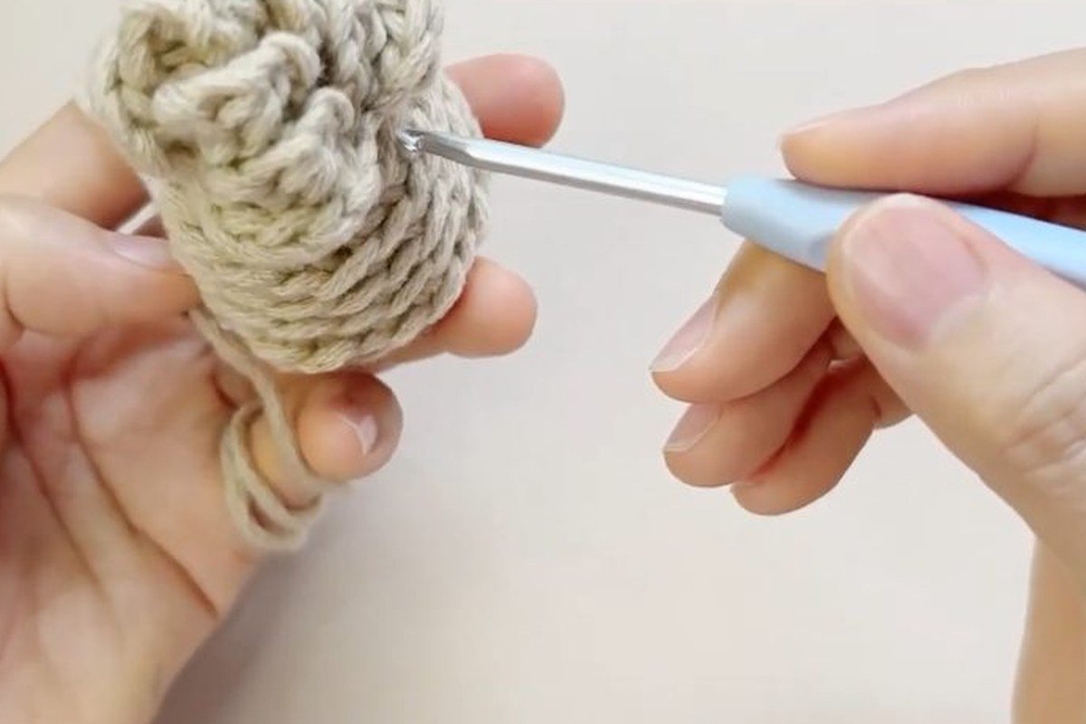 spiral of scales climbing a free crochet pinecone pattern