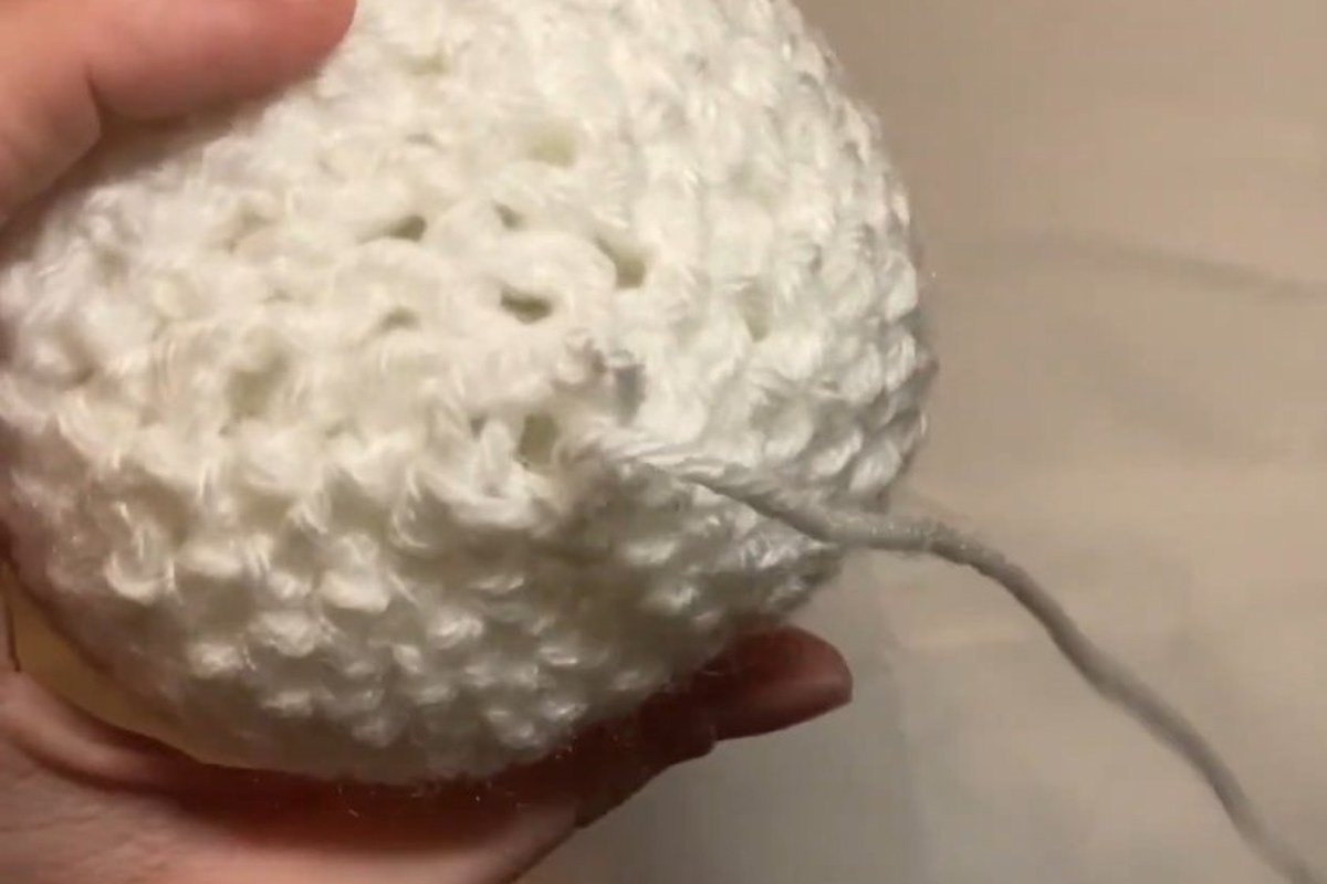closing the bottom of a free crochet snowman pattern