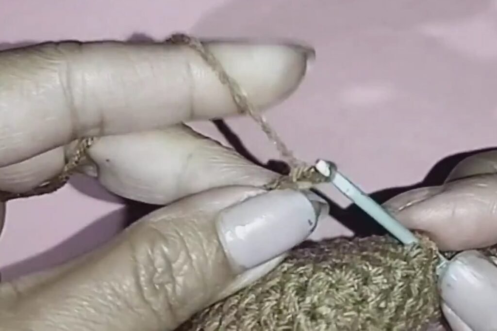 pointed ear added to the top of a crochet bat keychain