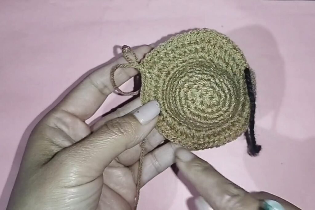 flat round disc for a crochet bat keychain after 11 rounds