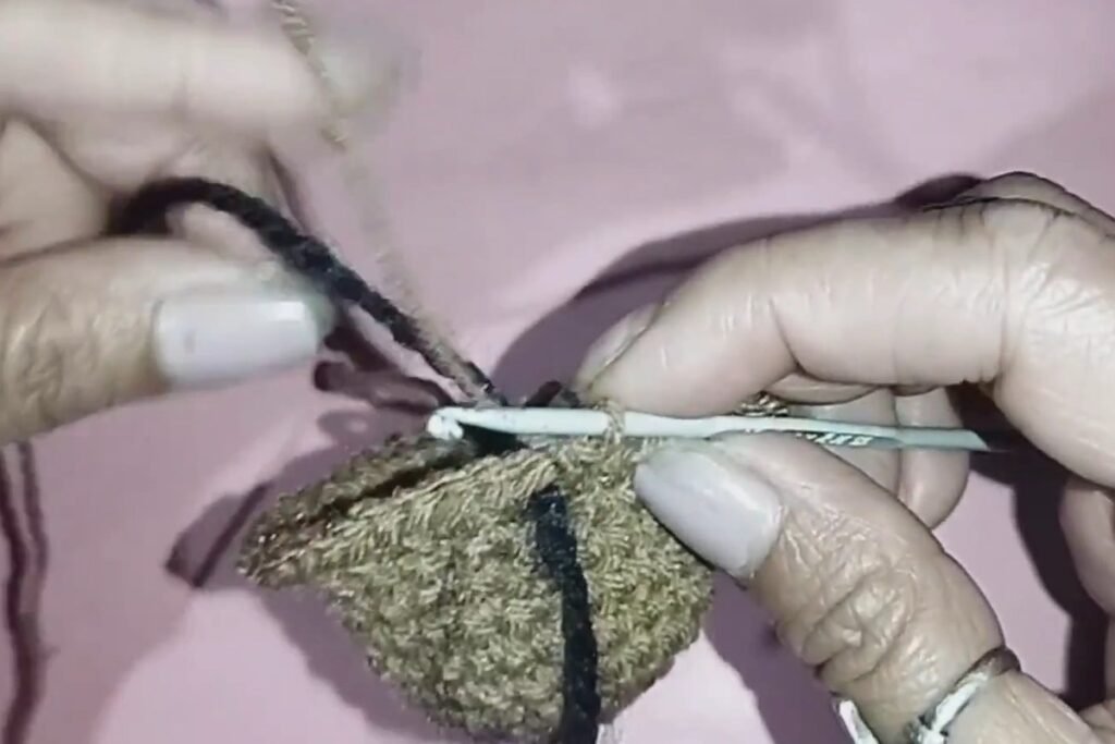 round 10 of a crochet bat keychain with 54 stitches