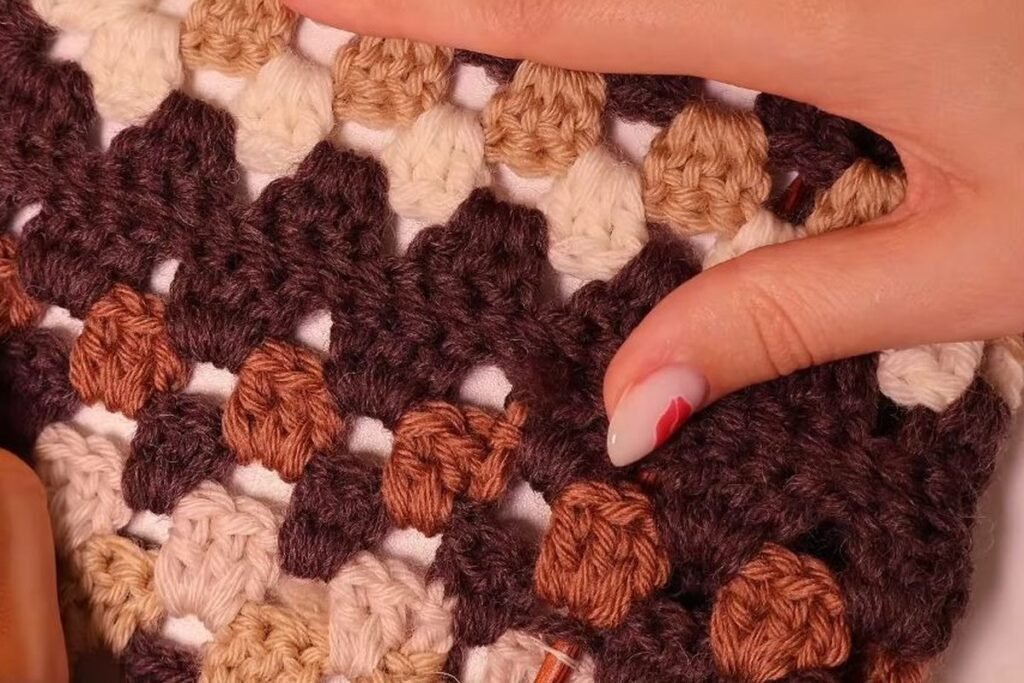 finished slip stitch seam between two granny squares seen from the right side