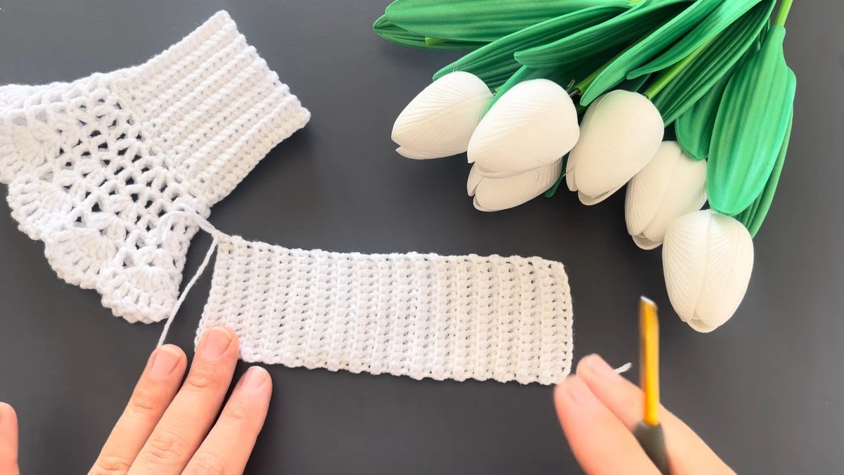 a long flat ribbed strip of single crochet for crochet lace wrist cuffs