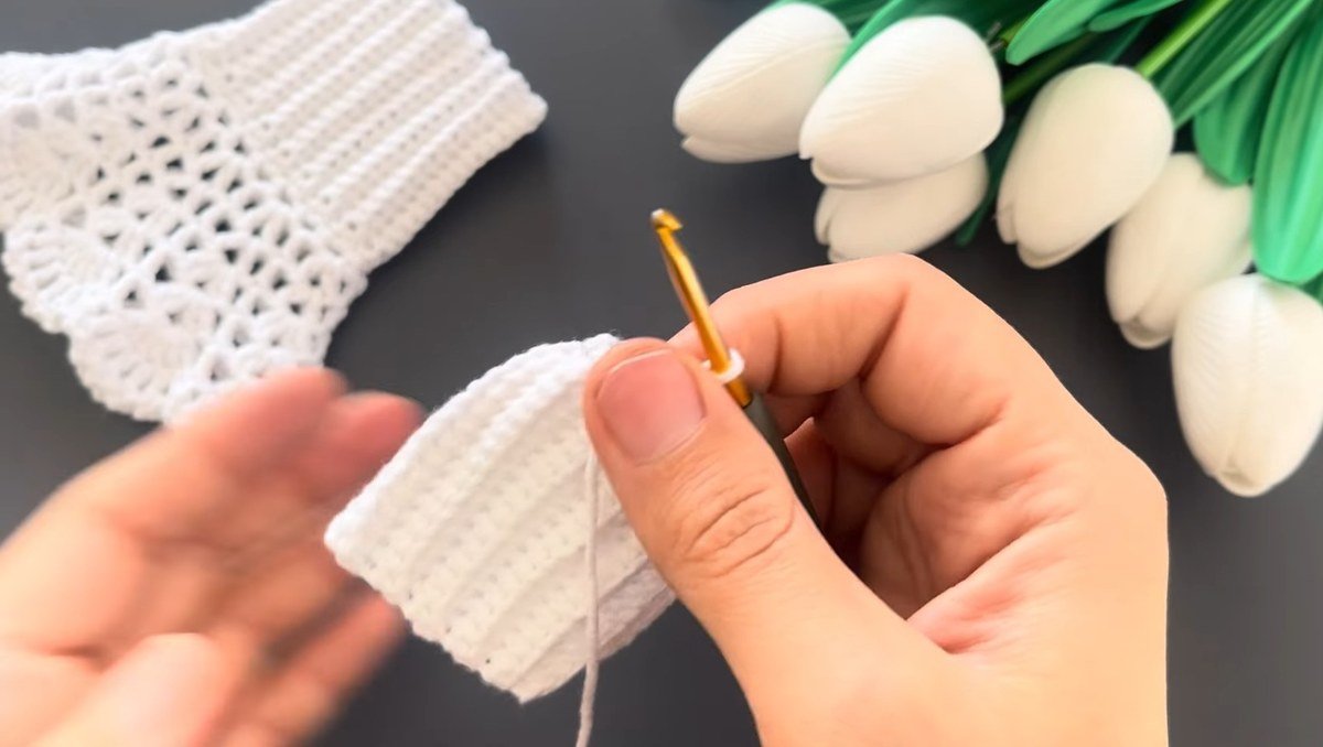 a ribbed band with a single crochet edge ready for lace, part of crochet lace wrist cuffs