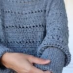 crochet pullover sweater pattern: finished bead stitch sweater worn, close view of the sleeve and body