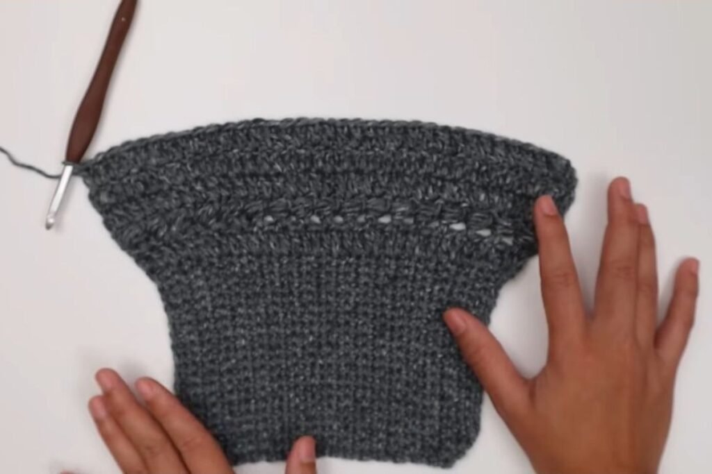 crochet pullover sweater pattern step 14: finished sleeve laid flat
