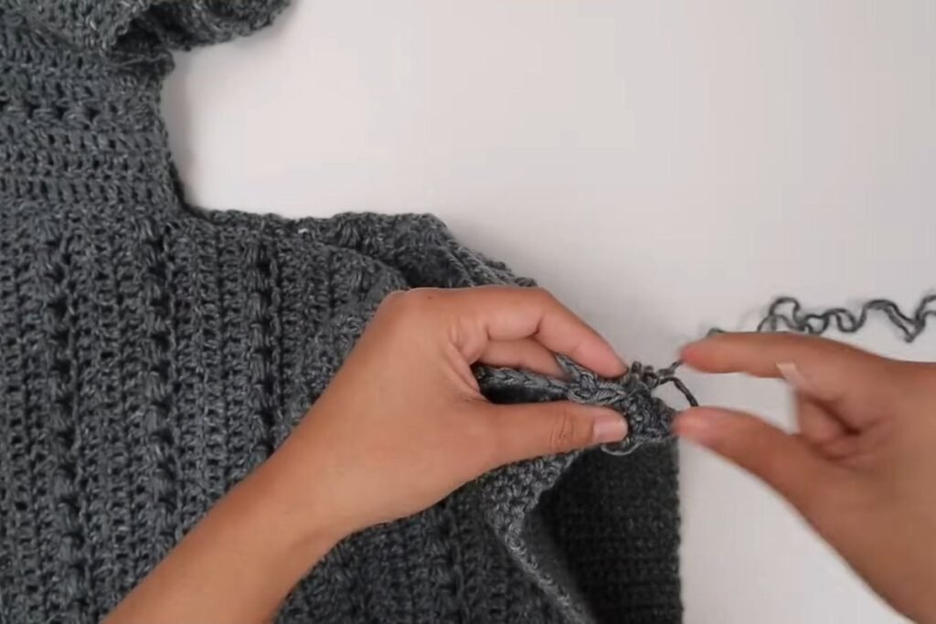 crochet pullover sweater pattern step 17: sewing the side seam with a yarn needle
