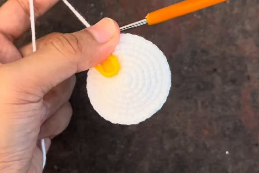 white crochet head dome after rounds 7 to 11