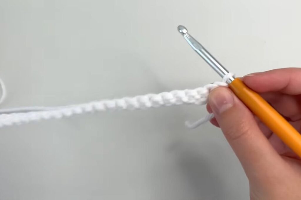 Chain one and turn at the end of the row in the easy crochet scarf pattern