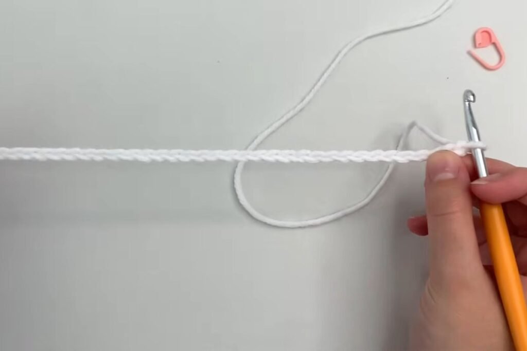Foundation chain of 45 for the easy crochet scarf pattern laid flat on a table