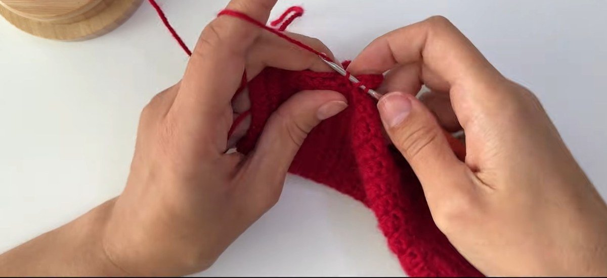 thumb row two with decreases in a free crochet fingerless gloves pattern