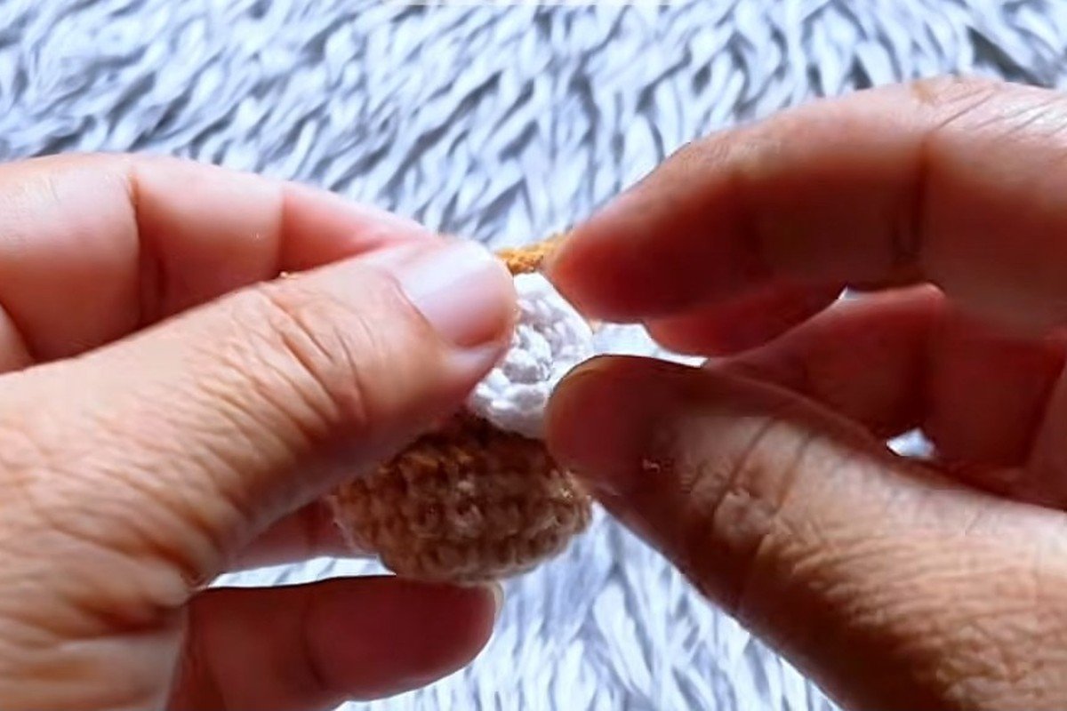 free crochet owl pattern step 15: glue on the white eyes