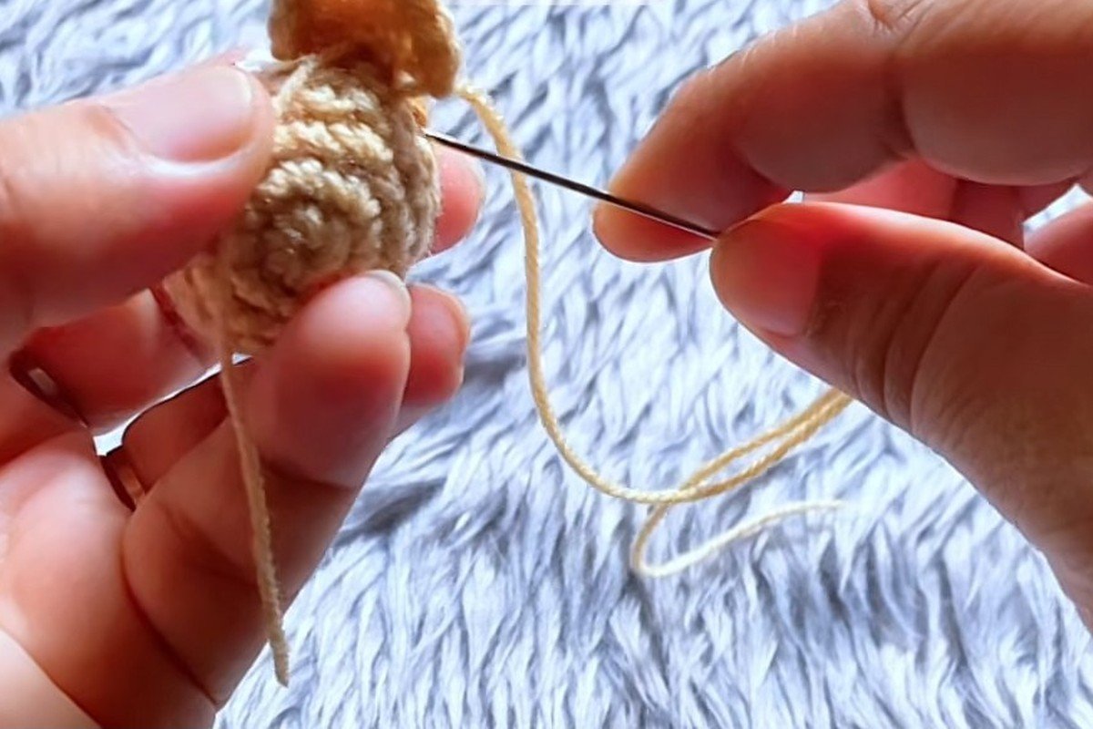 free crochet owl pattern step 17: sew on the wings