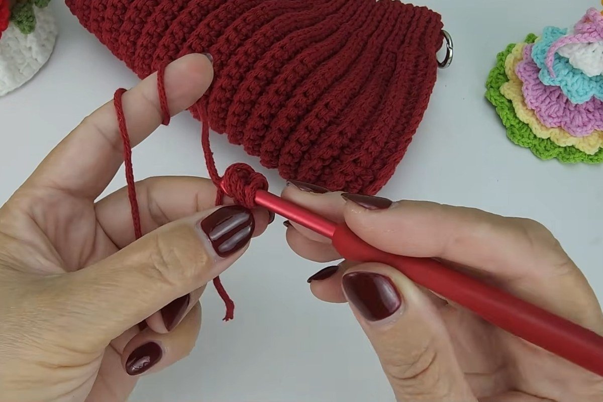 Crocheting the strap cord from the top corner of the bag
