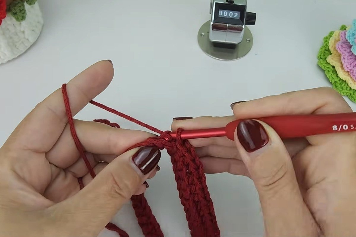 Hook inserted in the back loop only for Row 2 of the free crochet shoulder bag pattern