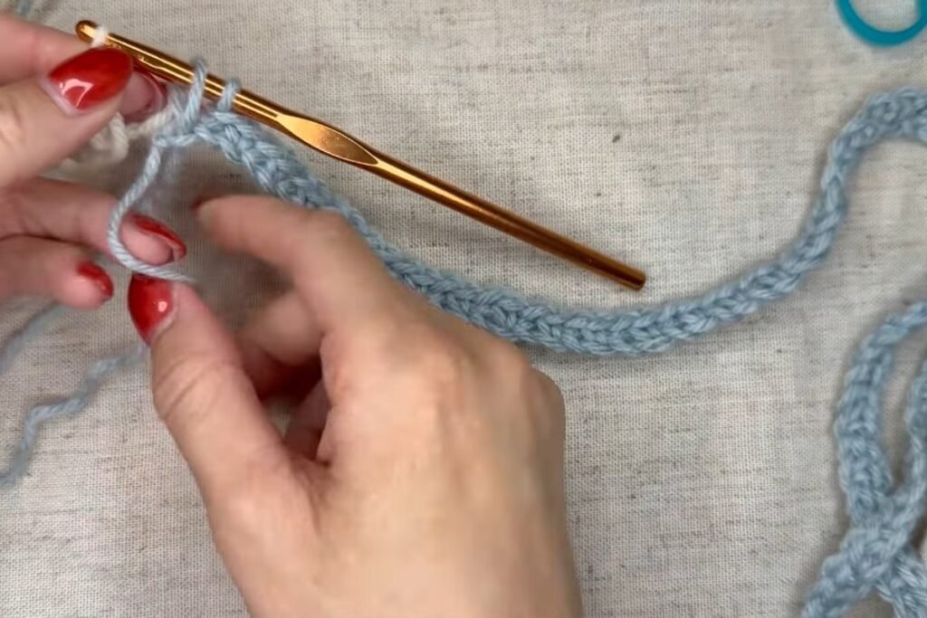 changing to cream yarn on the last single crochet of the row