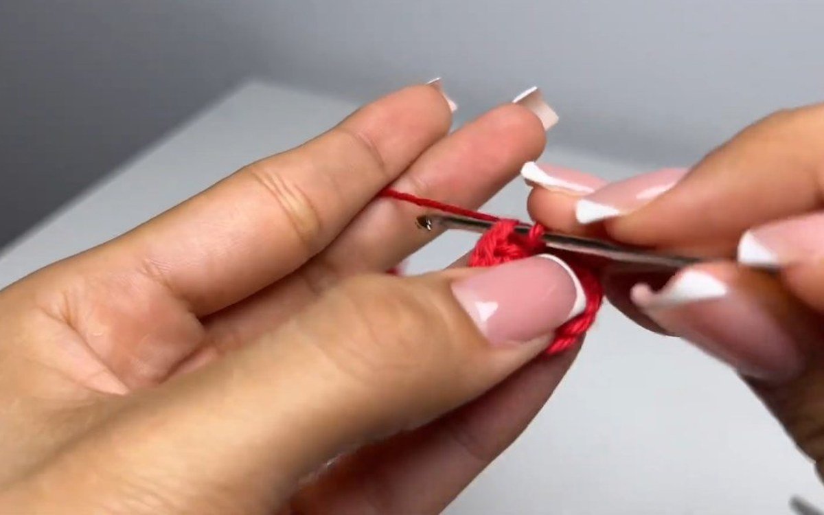 small red circle for the heart-shaped version of a crochet cherry keychain