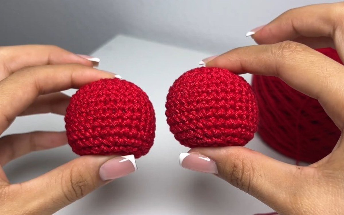 two round red cherries side by side for a crochet cherry keychain