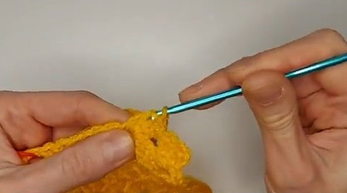 first strap row of double crochet clusters on a crochet vest pattern