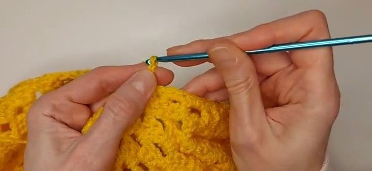 first ribbing strip chained 6 on the edge of a crochet vest pattern